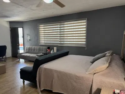 Cama o camas de una habitación en Loft cerca de la playa y el malecón