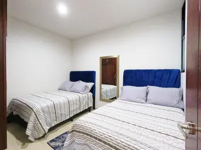 Cama o camas de una habitación en Isla Esmeralda Azul 1 Min Playa y Zona Dorada