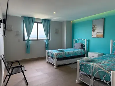 Cama o camas de una habitación en Apartamento en la explanada con vistas
