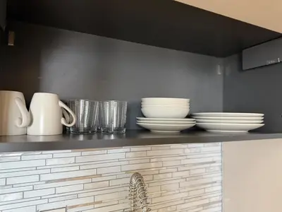 Utensilios para hacer té y café en Apartamento en la explanada con vistas
