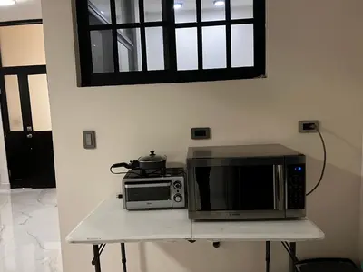 Una cocina o zona de cocina en Casa nueva y moderna en el corazón de la ciudad