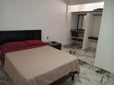 Cama o camas de una habitación en La Terraza-Habitación 6