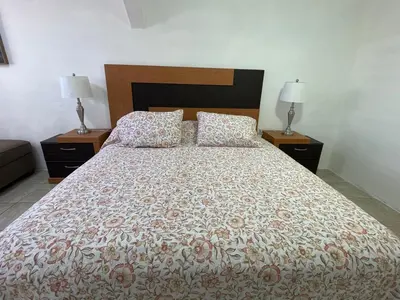 Cama o camas de una habitación en La Alameda you will feel pampered by the comfort