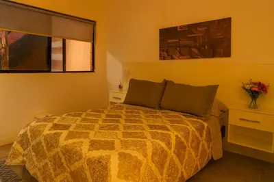 Cama o camas de una habitación en Departamento Confort Colinas