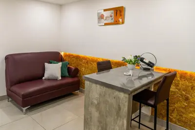 Zona de estar de Departamento Confort Colinas