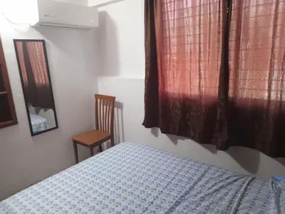 Cama o camas de una habitación en Departamentos Vacacionales ISB