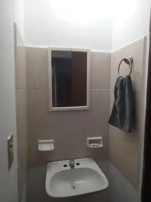 Un baño de Departamentos Vacacionales ISB