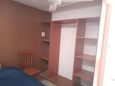 Cama o camas de una habitación en Departamentos Vacacionales ISB