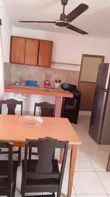 Una cocina o zona de cocina en Departamentos Vacacionales ISB