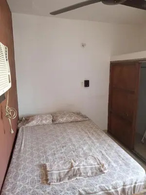 Cama o camas de una habitación en Departamentos Vacacionales ISB