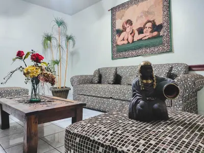 Zona de estar de Hotel oasis suites