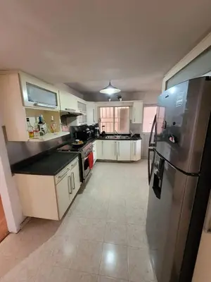 Una cocina o zona de cocina en Amplia Casa