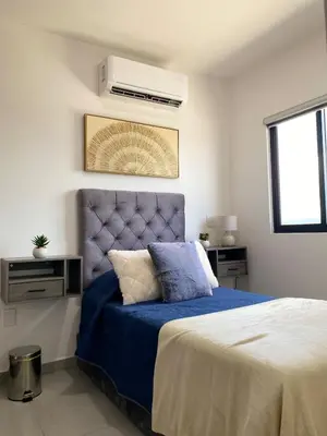 Cama o camas de una habitación en Departamento arcangel residencial