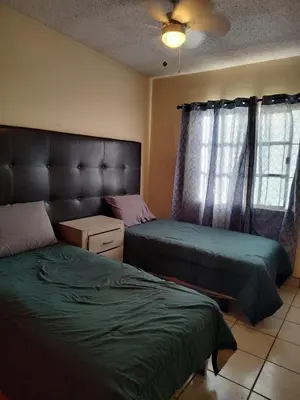 Cama o camas de una habitación en Casa 2121