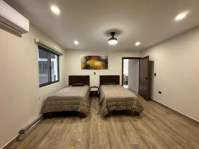 Cama o camas de una habitación en nueva casa lomas