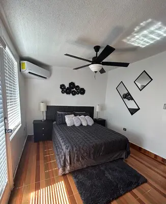 Cama o camas de una habitación en Estudio práctico y confortable en segundo piso