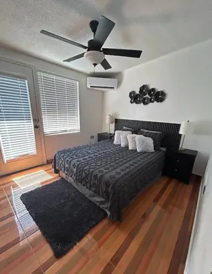 Cama o camas de una habitación en Estudio práctico y confortable en segundo piso