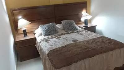 Cama o camas de una habitación en Tesoro Palmas Resort