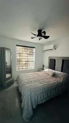 Cama o camas de una habitación en Casa cómoda