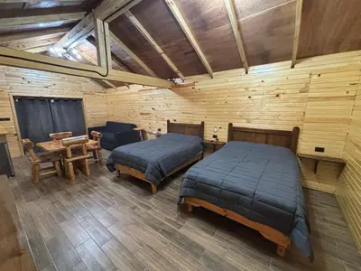 Cama o camas de una habitación en Cabañas La Esperanza