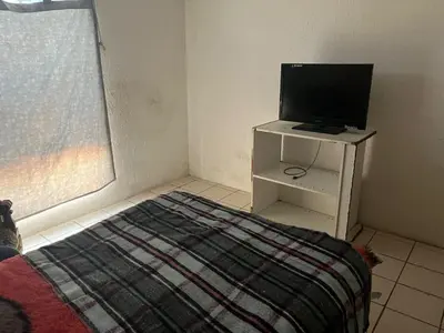 Una televisión o centro de entretenimiento en La casa del buen paso