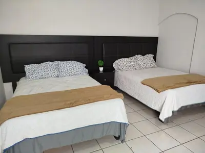 Cama o camas de una habitación en Tlaxcala Apartment # 4