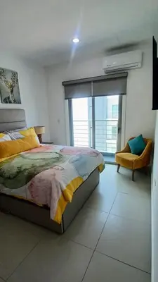 Cama o camas de una habitación en Portezza Residencial de Lujo Familiar