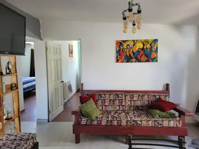 Zona de estar de El DepaColonia Granjas on the Upper Floor