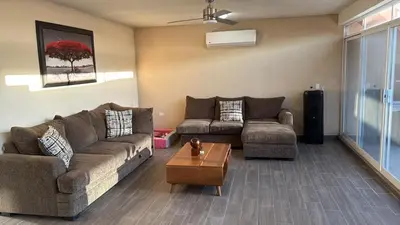 Zona de estar de Furnished apartment 10 minutes from the consulate
