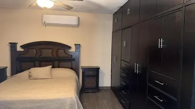 Cama o camas de una habitación en Furnished apartment 10 minutes from the consulate