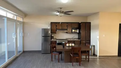 Una cocina o zona de cocina en Furnished apartment 10 minutes from the consulate