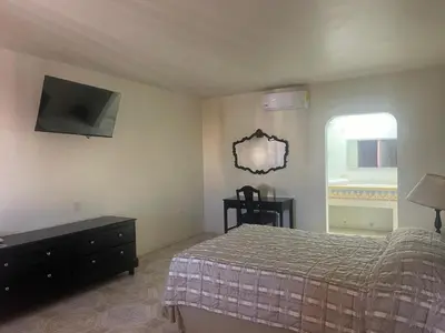 Cama o camas de una habitación en Hotel Colonial