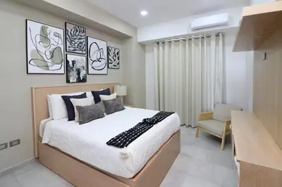 Cama o camas de una habitación en Beautiful and New Bahía Serena Condominium