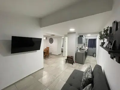 Una televisión o centro de entretenimiento en Casa bbb