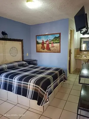 Cama o camas de una habitación en Paraiso del bosque