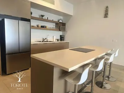 Una cocina o zona de cocina en Condominio Frente al Mar