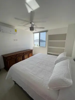 Cama o camas de una habitación en Entire penthouse with sea view in Zona Dorada - 3 bedrooms