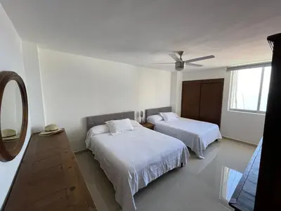 Cama o camas de una habitación en Entire penthouse with sea view in Zona Dorada - 3 bedrooms