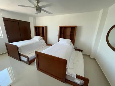 Cama o camas de una habitación en Entire penthouse with sea view in Zona Dorada - 3 bedrooms