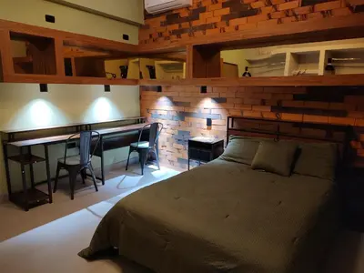Cama o camas de una habitación en Amber Apartment at Downtown