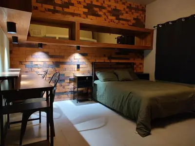 Cama o camas de una habitación en Amber Apartment at Downtown