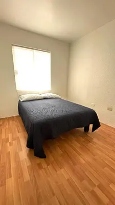 Cama o camas de una habitación en Casa a 4 Min Parque Industrial