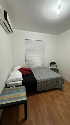 Cama o camas de una habitación en Casa a 4 Min Parque Industrial