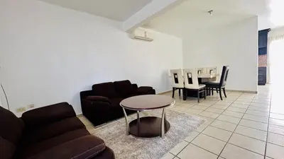 Zona de estar de Casa a 4 Min Parque Industrial
