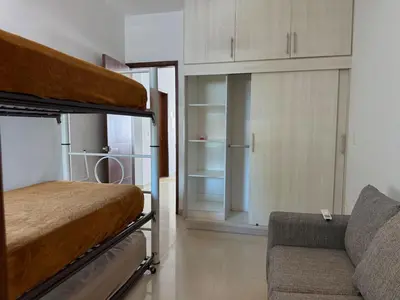 Cama o camas de una habitación en Depa a unas Calles de la Playa By GPSRentas