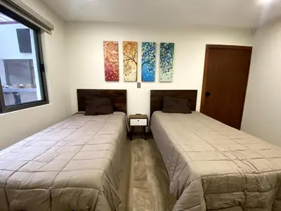 Cama o camas de una habitación en Brand new residence in Mazatlán