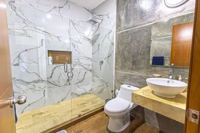 Un baño de Departamento Moderno de DOS recamaras cerca de la playa, Malecón y Gran Plaza