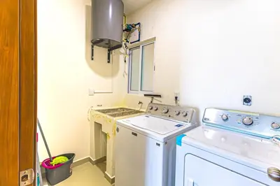 Una cocina o zona de cocina en Departamento Moderno de DOS recamaras cerca de la playa, Malecón y Gran Plaza