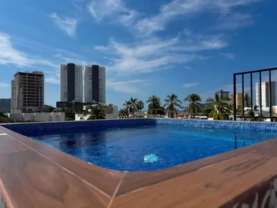 Piscina en o cerca de Depa A unas calles de la Playa y Zona Dorada ByGPS