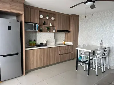 Una cocina o zona de cocina en Hermoso departamento con vista al mar